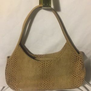 Diane skin frame bag of different shades of tan